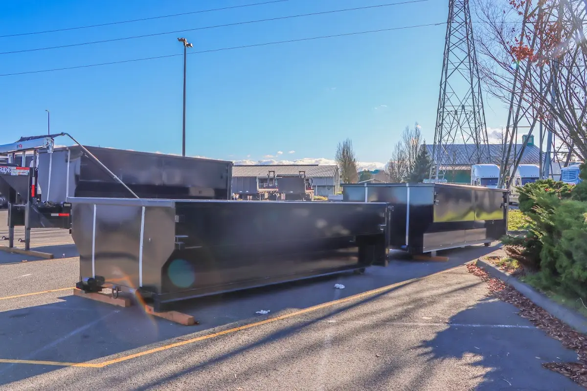 Roll-off dumpster ready for waste disposal at job site for Concrete Dumpster Rental in Oberlin